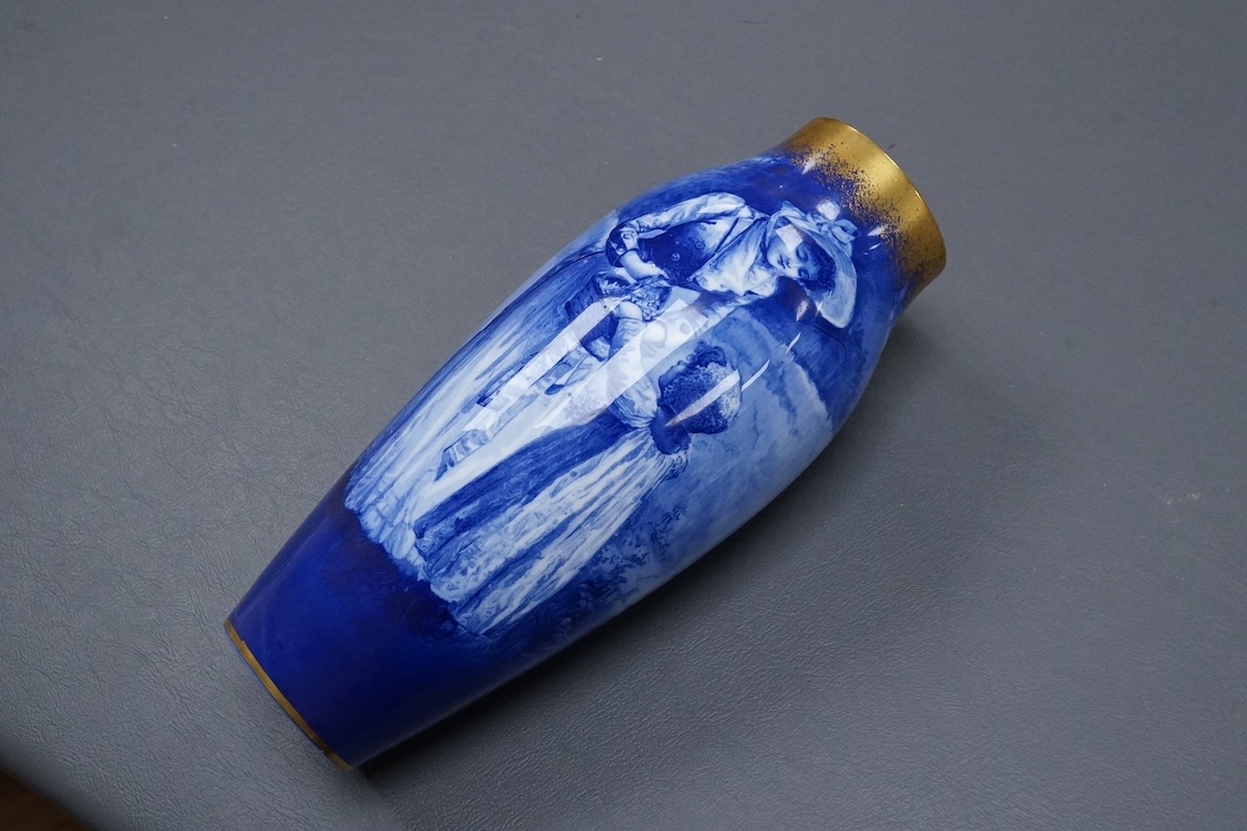 A Royal Doulton figural vase painted in blue with gilt top, 22cm high